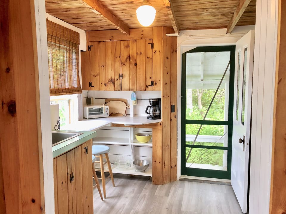 Kitchen leading to back deck