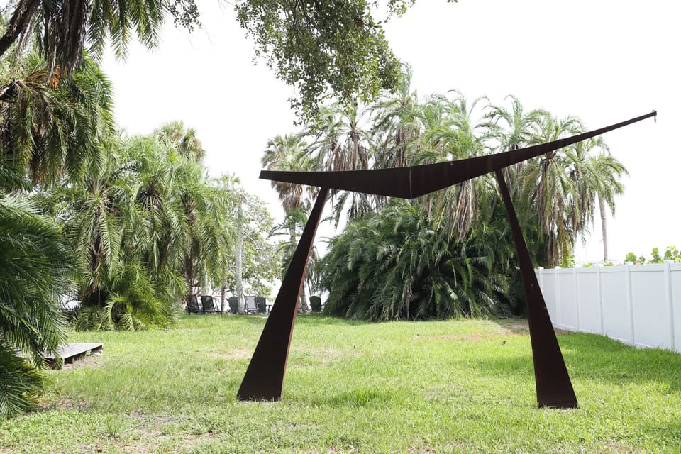 Walk through the backyard through the sculptures to the shared private beach