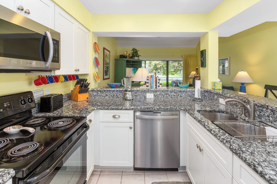 Fully stocked kitchen with new appliances in 2024.