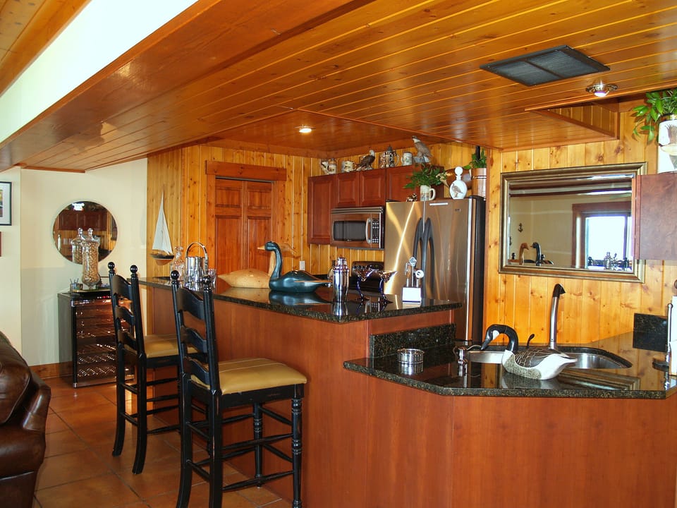 Bar with a Second full Kitchen abuts the Living Room with an Amazing Lake View!