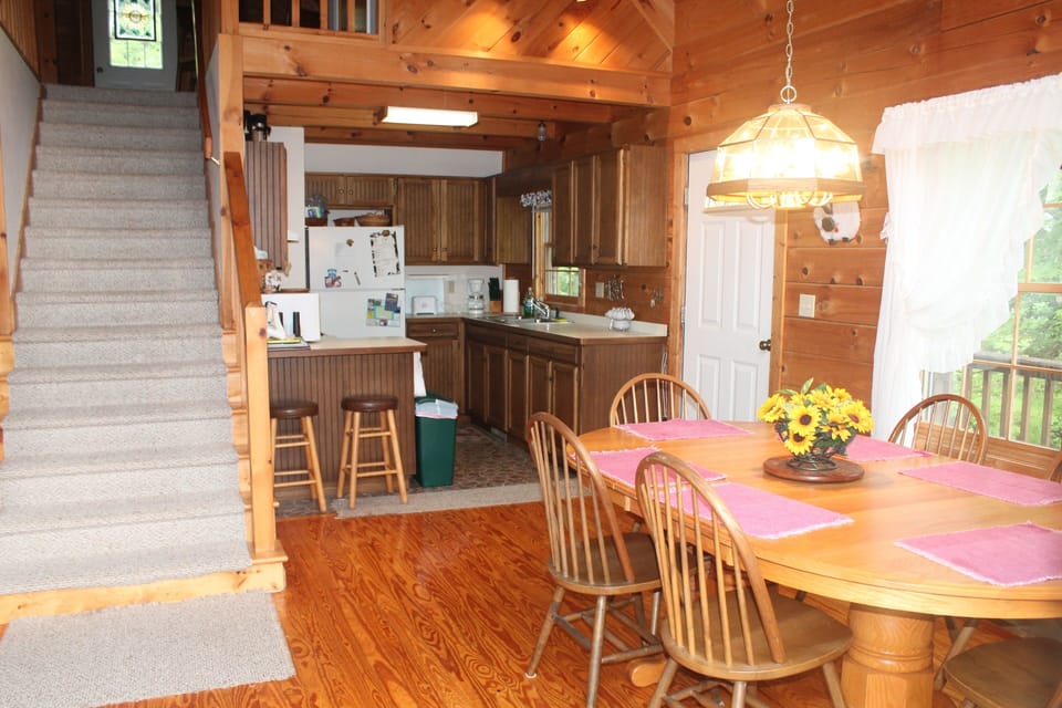 Full size refrigerator, stove, oven, coffee maker, toaster & microwave oven.