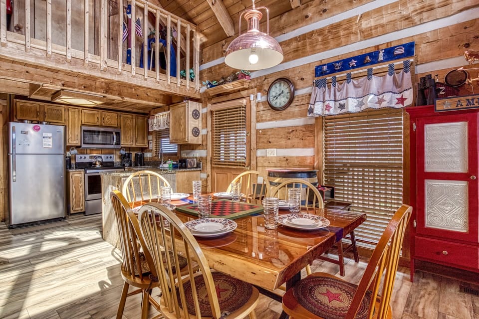 Pet Friendly Cabin in the Smokies "Old Glory" - Dining table and fully furnished kitchen