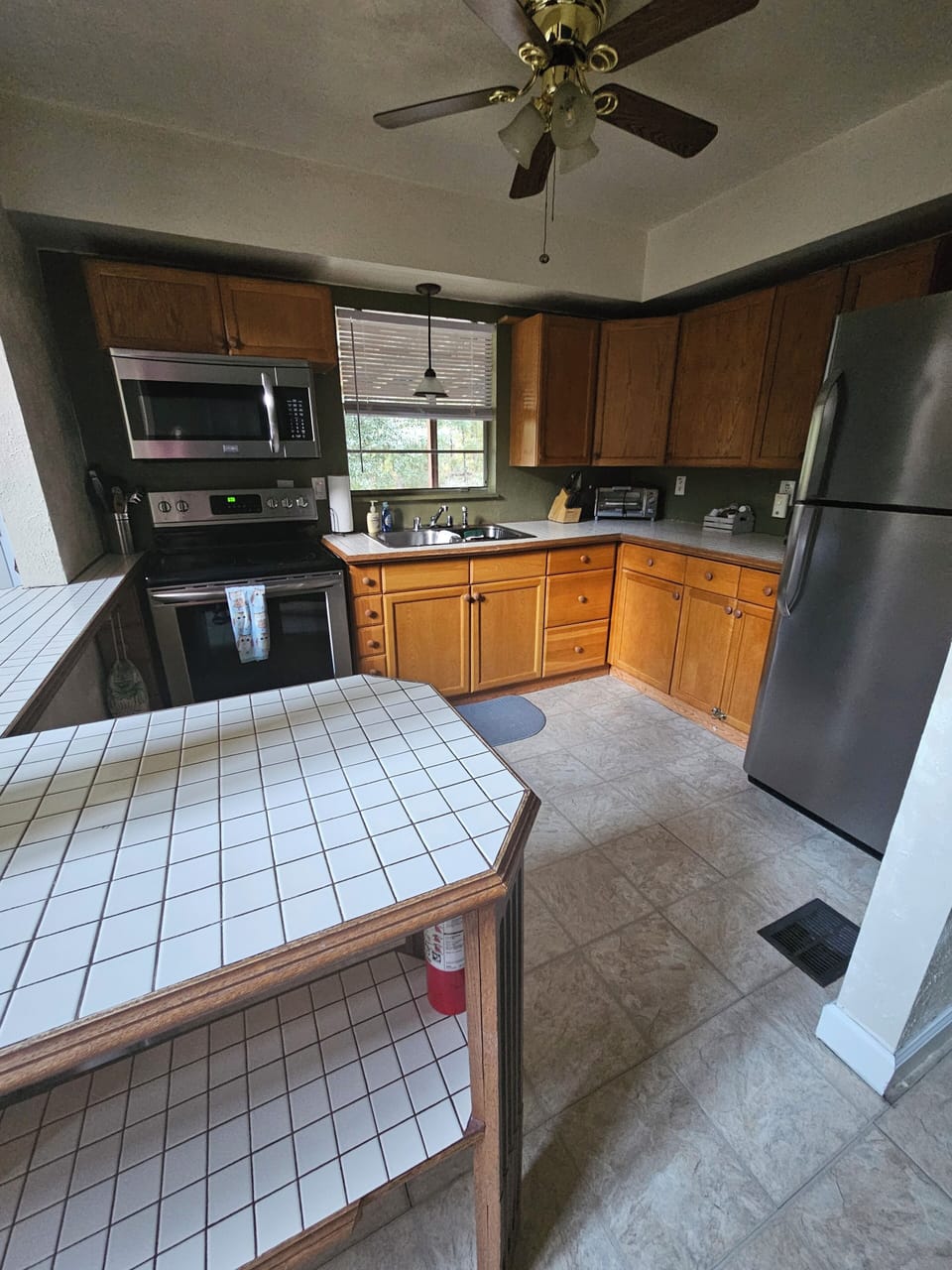 kitchen with everything you need to cook. icemaker in refrigerator