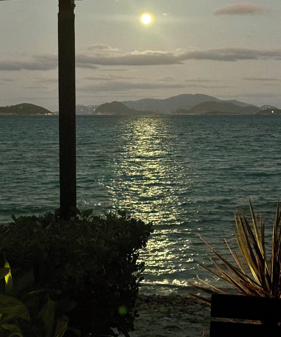 Ahh, full moon nights... Looks as if you could walk from condo to St. John...