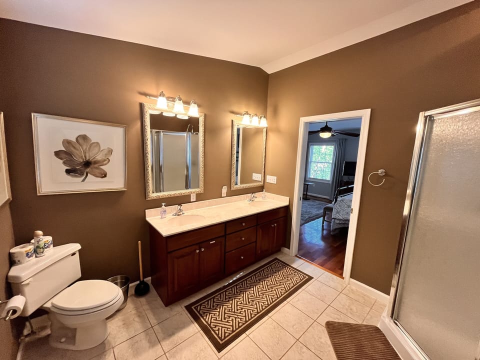 Large master bath with double sinks.