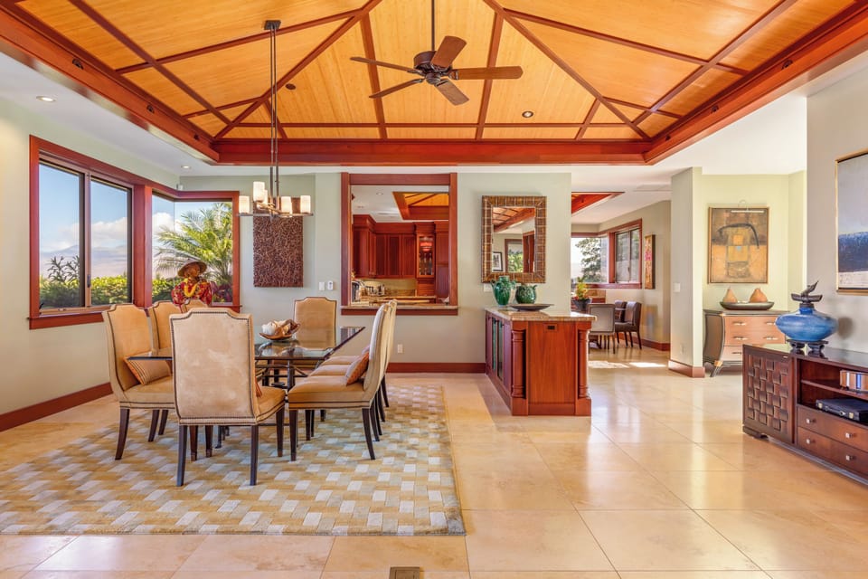 Host unforgettable meals in the open dining space that flows effortlessly into the kitchen and lanai.