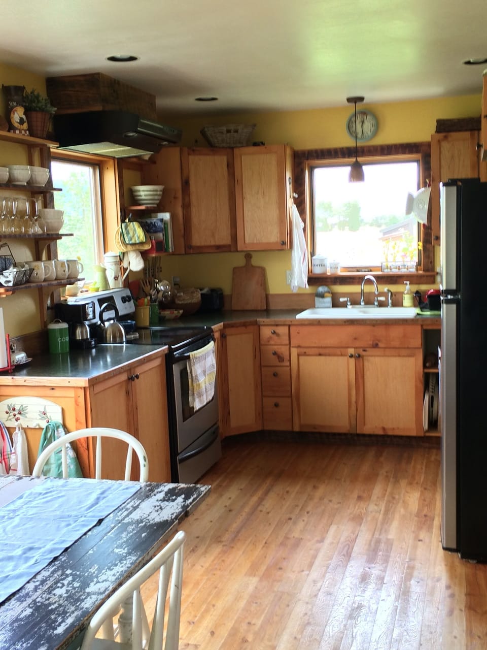 Light and bright and fully equipped French country style kitchen 