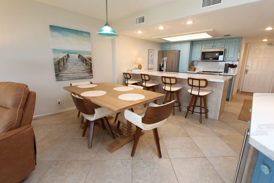 The Dining Table Sits Four  Guest