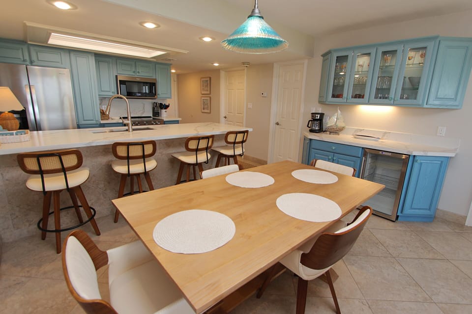 Ther is extra sitting in the kitchen area