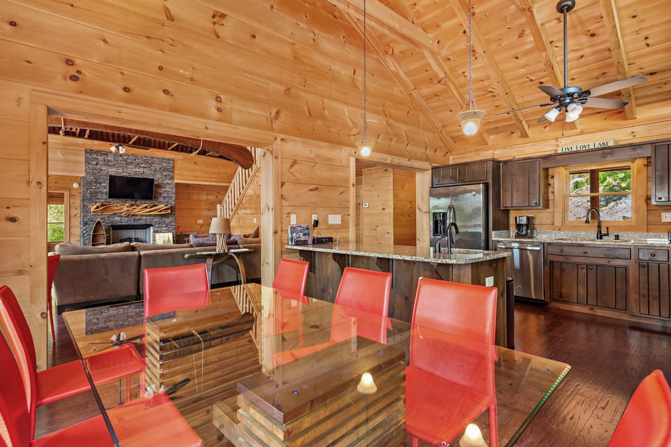 Dining and kitchen open to main level family room. Seating for 14