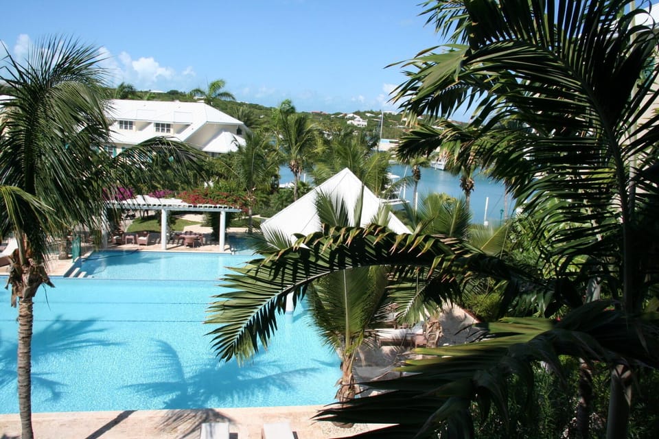 D11 patio view over pool and marina.