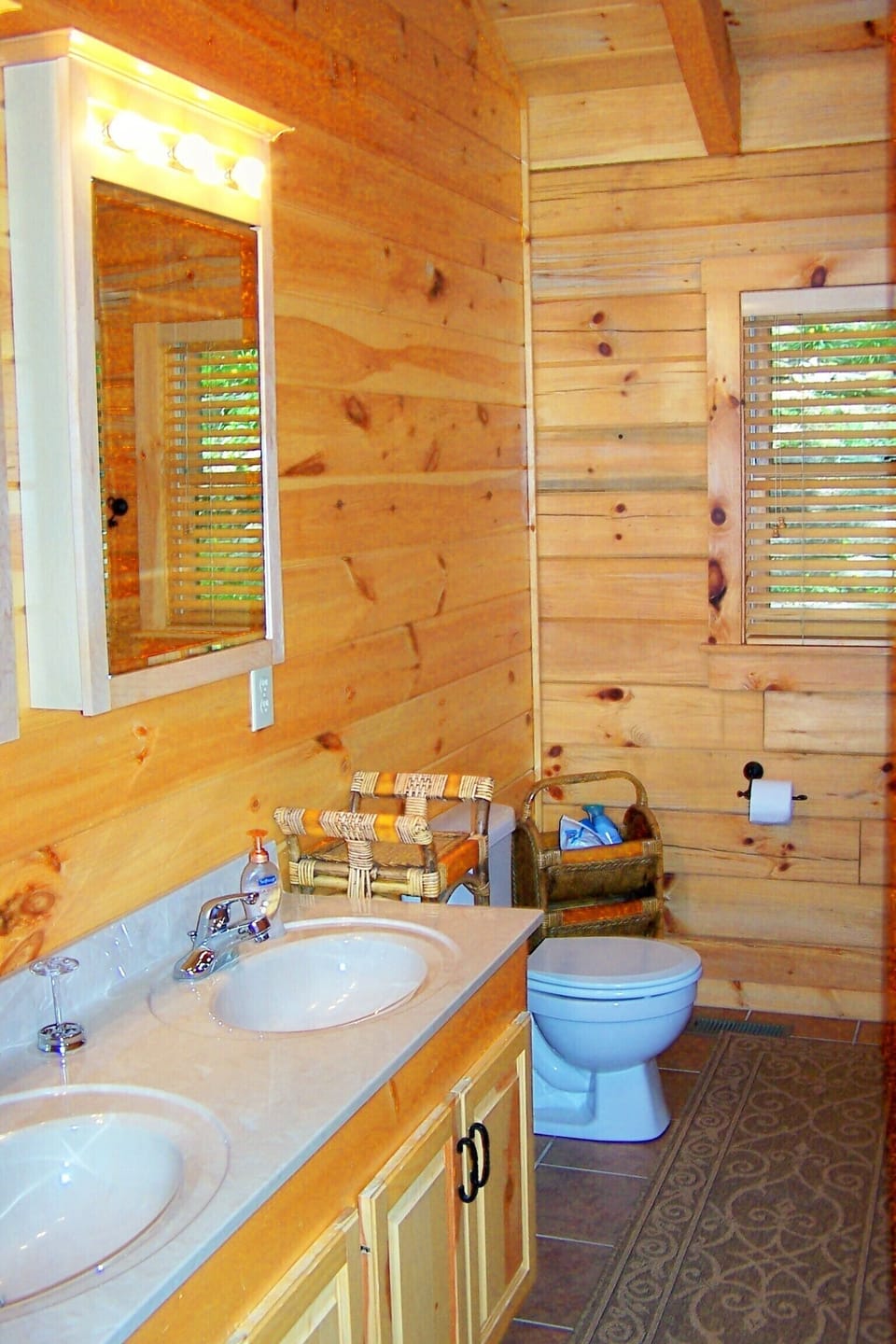 Lower Level Bath-double sink & shower/tub. large linen closet.