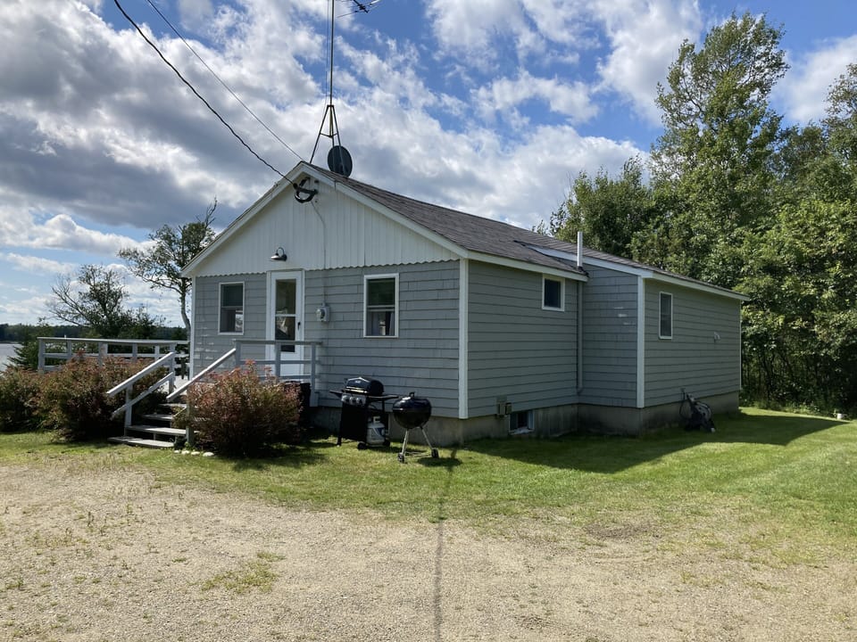Cottage from driveway … gas and charcoal grill available