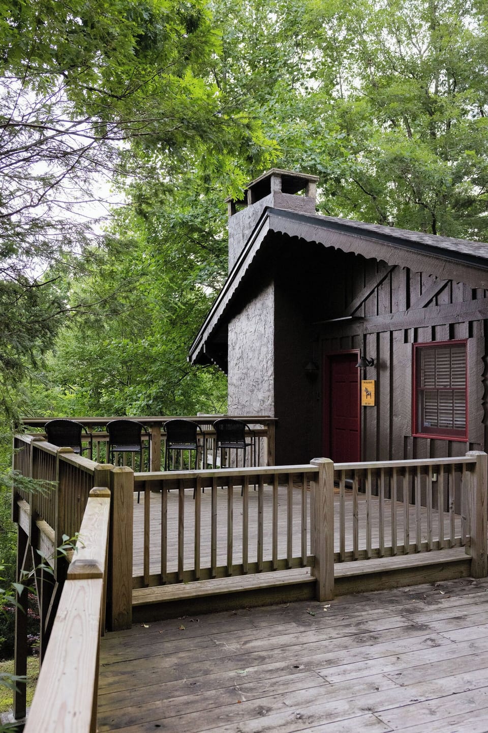 Enjoy peaceful woodland surroundings, beautiful sunsets, and seasonal glimpses of the surrounding mountains from the front deck.