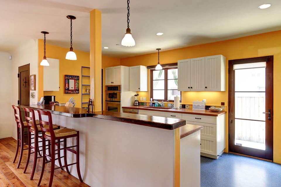 Bright kitchen with many of the items you need to cook or BBQ outside.