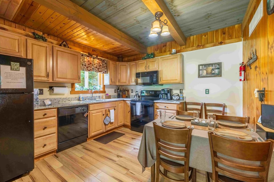 Enjoy a sit-down meal at our table for four in the cozy eat-in kitchen
