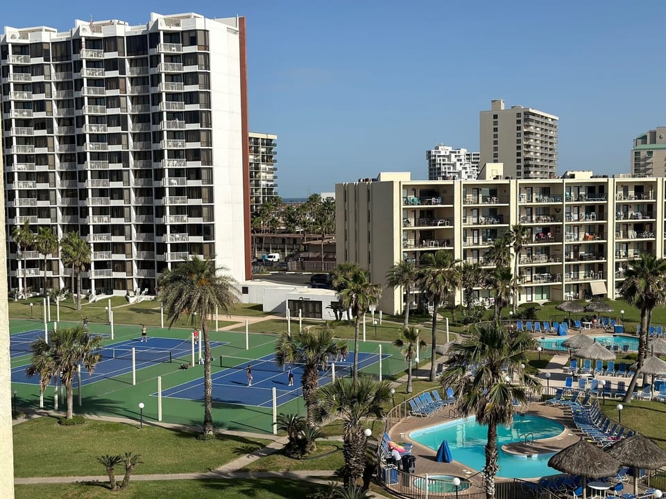 View from balcony!  Pools and Hot Tubs and courts for Tennis & Pickleball