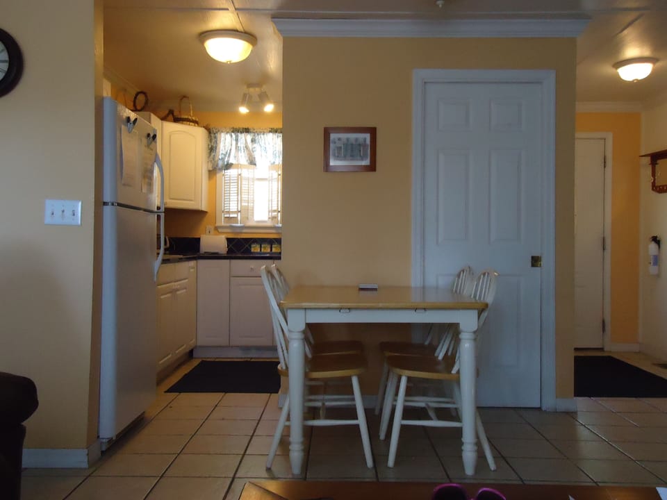 KITCHEN / DINING AREA...neat as a pin & well stocked with dishes, toaster etc