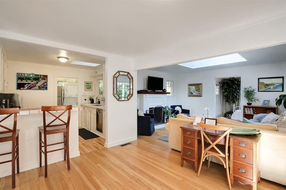 Desk area by living room and views into the kitchen.