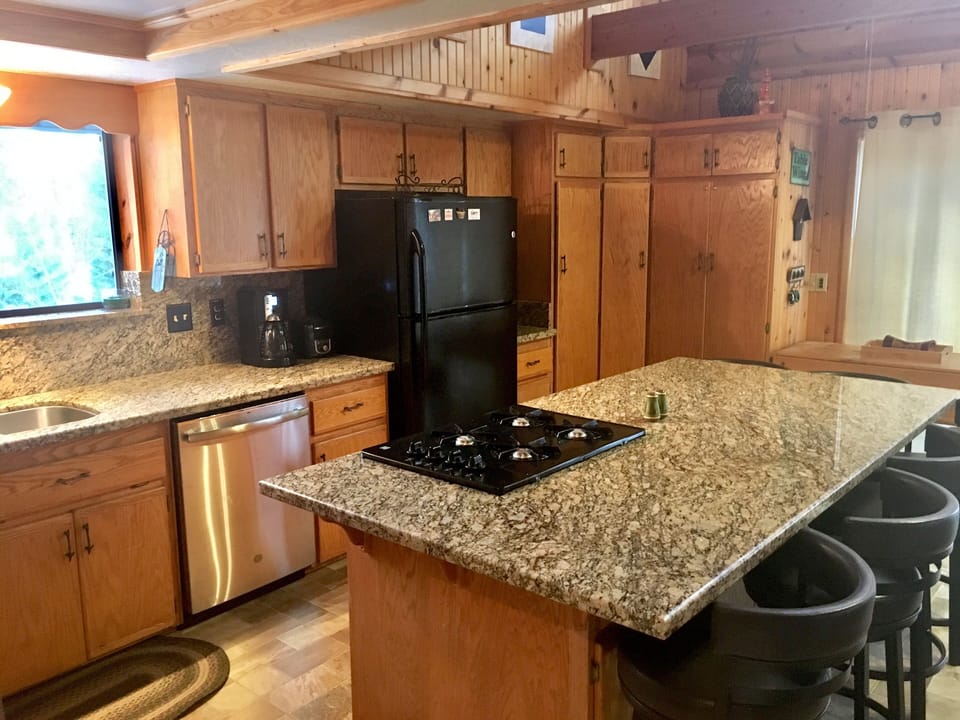 Functional and comfortable kitchen with a large island. 