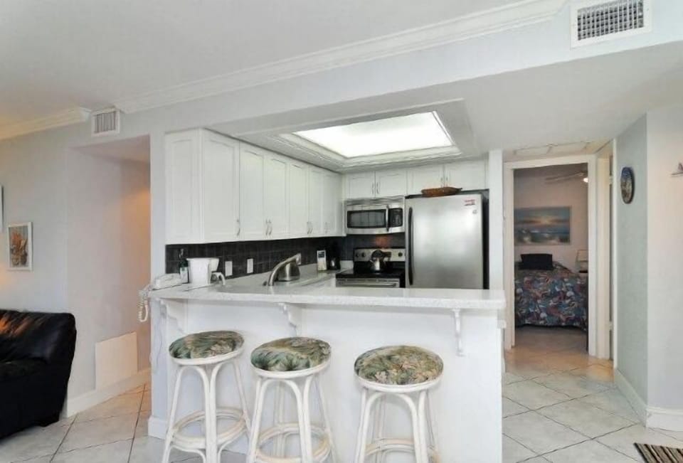 Full view of kitchen with ceiling lights 