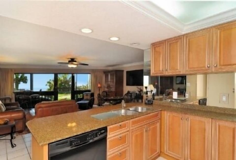 Stocked with kitchen supplies and has dishwasher