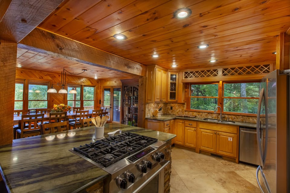 Stunning Granite Countertops, Stainless Steel Appliances, and All the Utensils You Could Desire Await You!
