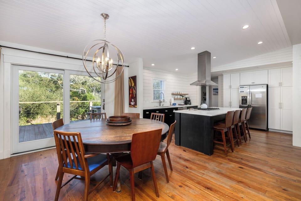 An open floor plan leads you from the living area to the dining room and kitchen