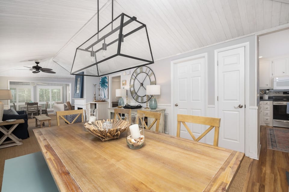 Enter Carolina Sunset to your front entryway with large dining table