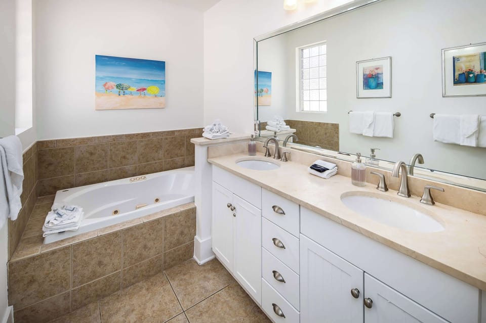 Second floor master bathroom with soaking tub and double sinks (Jets are not operable)
