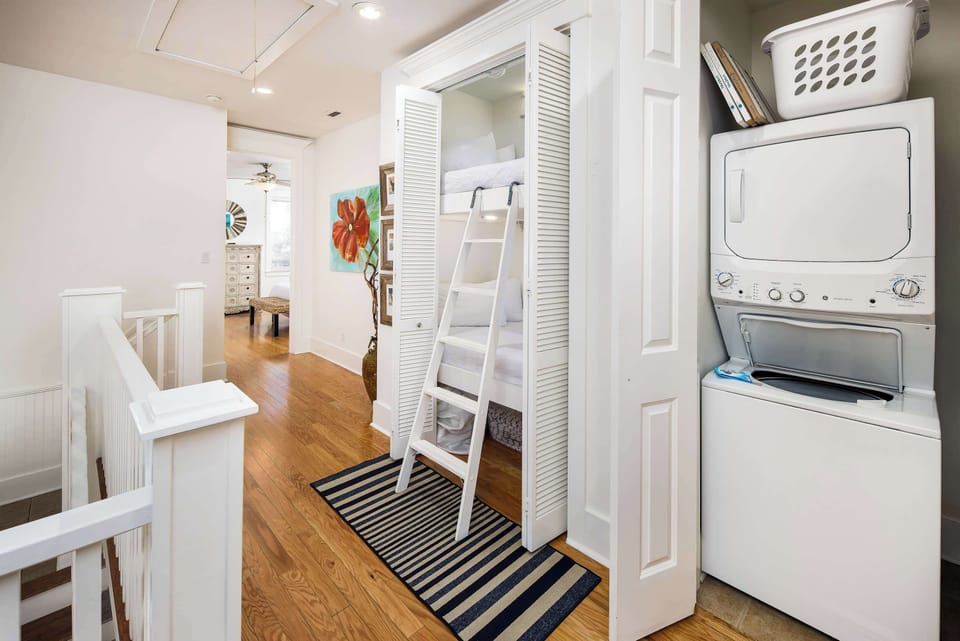 Second floor twin size bunk beds in the hallway and washer/Dryer