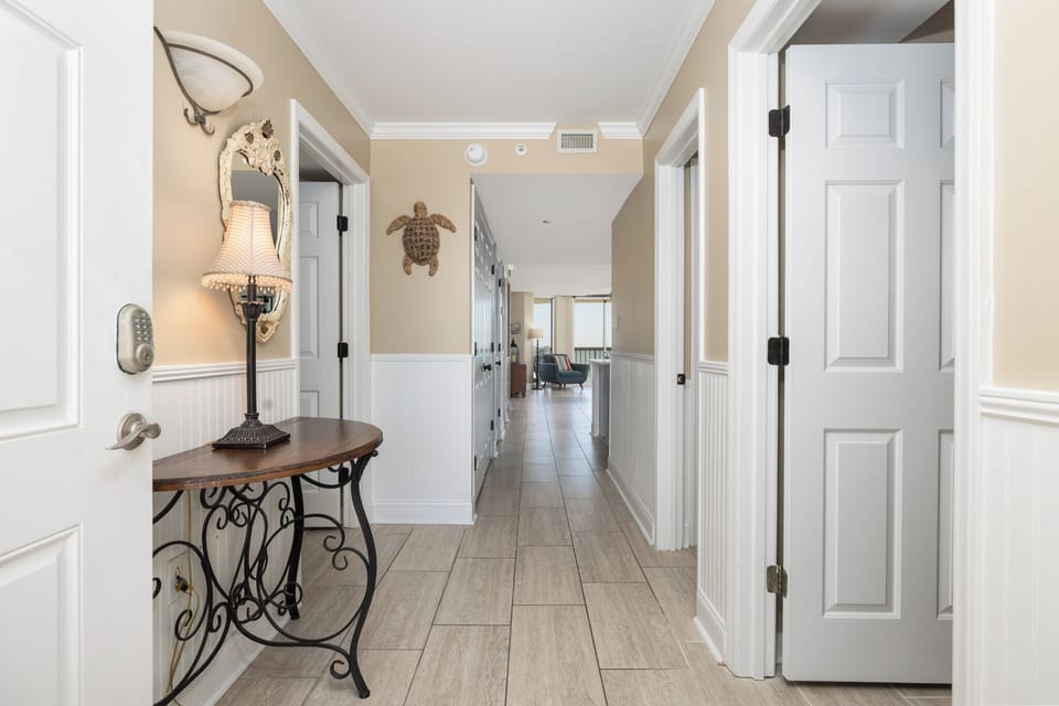 Step into Peaches and Cream and take the hallway to your main living space