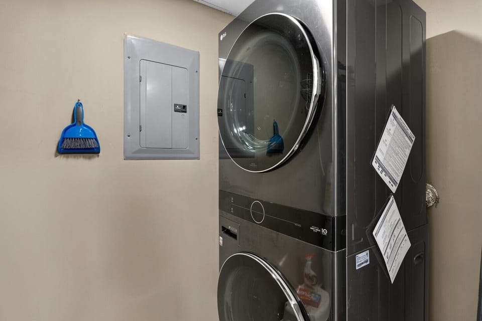 Stack washer and dryer in unit