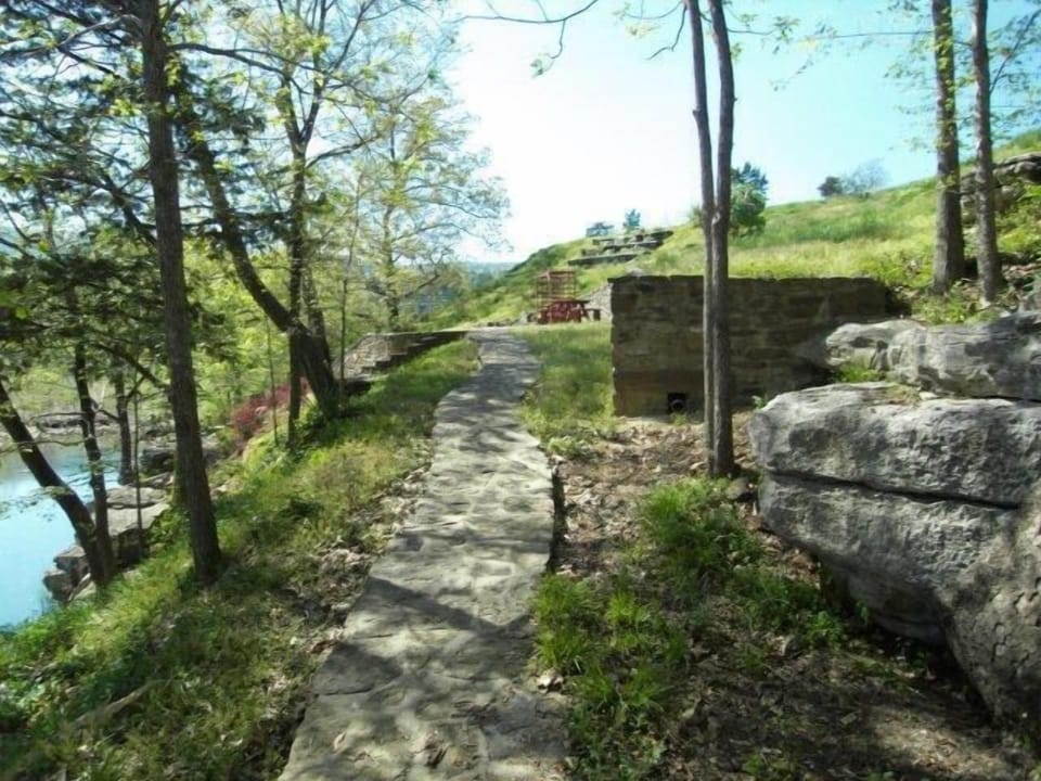 Flagstone pathways and steps leading down to the River throughout the property!