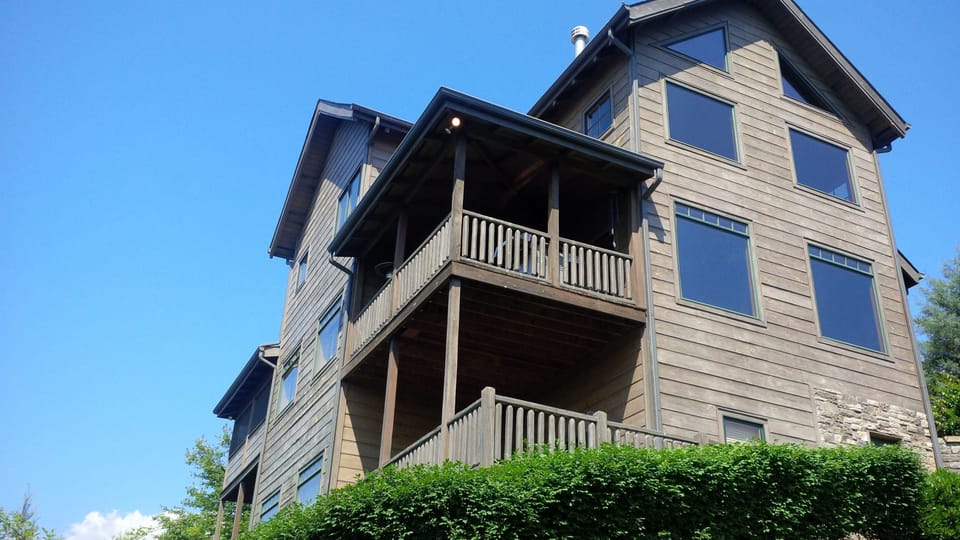 Rear of home showing 4 private decks