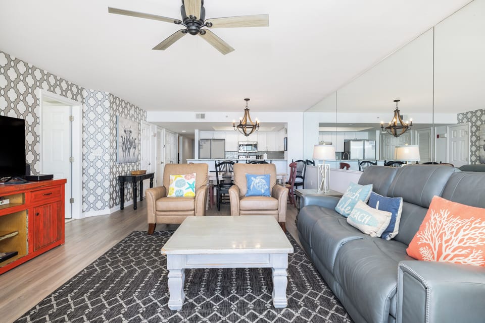 Bright Living Area with comfortable seating and direct balcony access
