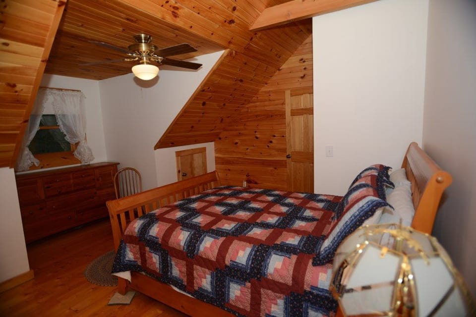 Upstairs queen bedroom near shared full bathroom