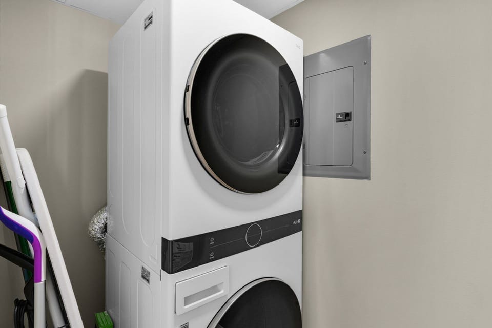 Stack washer and dryer in unit