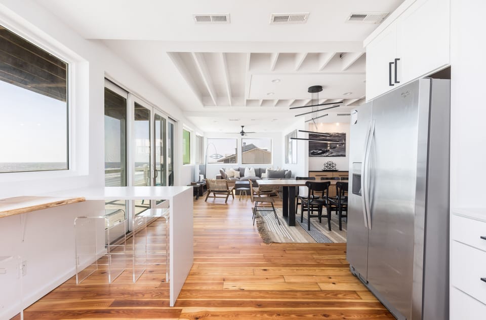 Modern dining space opening directly into the kitchen