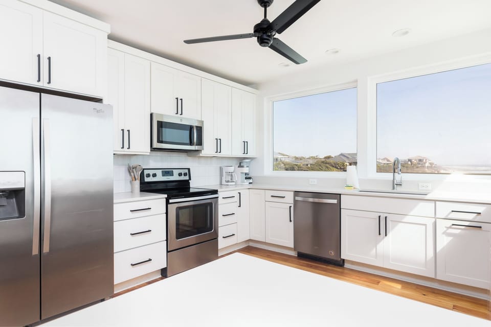 Your kitchen is equipped with stainless steel appliances and everything you need to make your favorite meals
