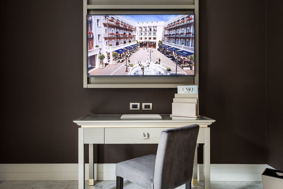 Premium bedding, down comforters, minibar, in-room safe