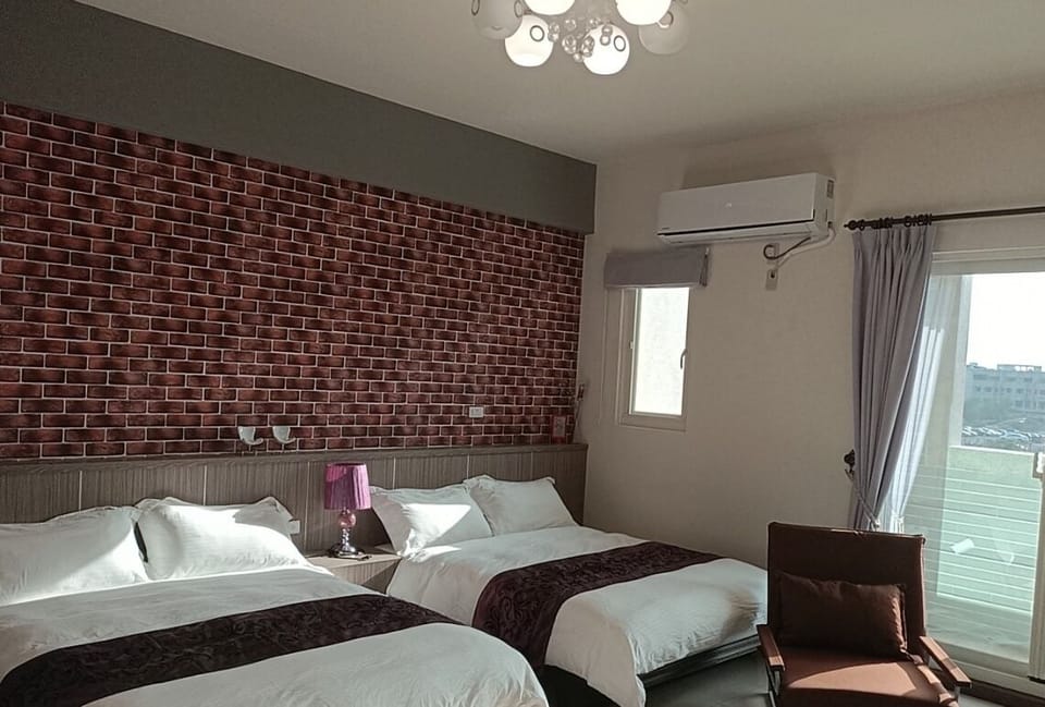Standard Quadruple Room | Down comforters, desk, blackout drapes, free WiFi