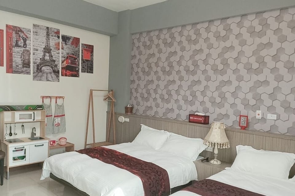 Basic Quadruple Room | Down comforters, desk, blackout drapes, free WiFi