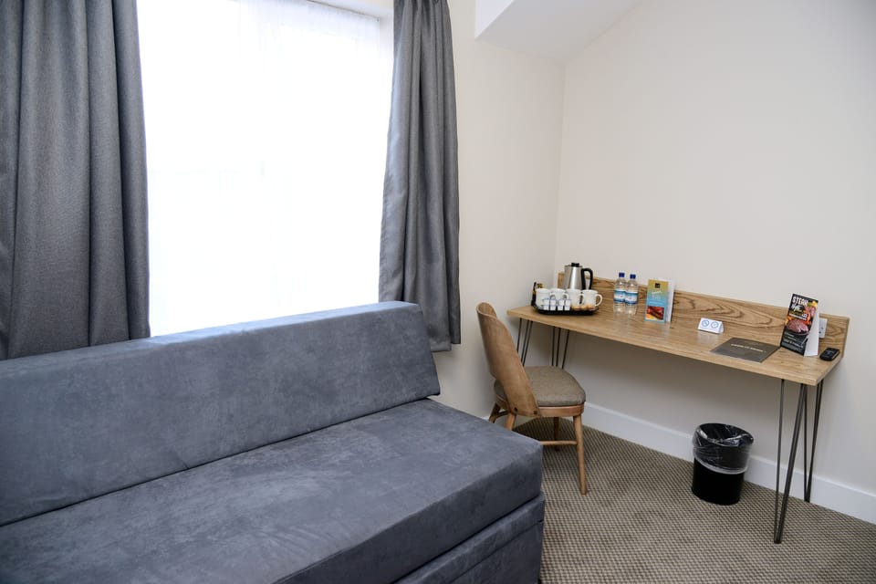 Family Room | Desk, iron/ironing board, travel crib, free WiFi