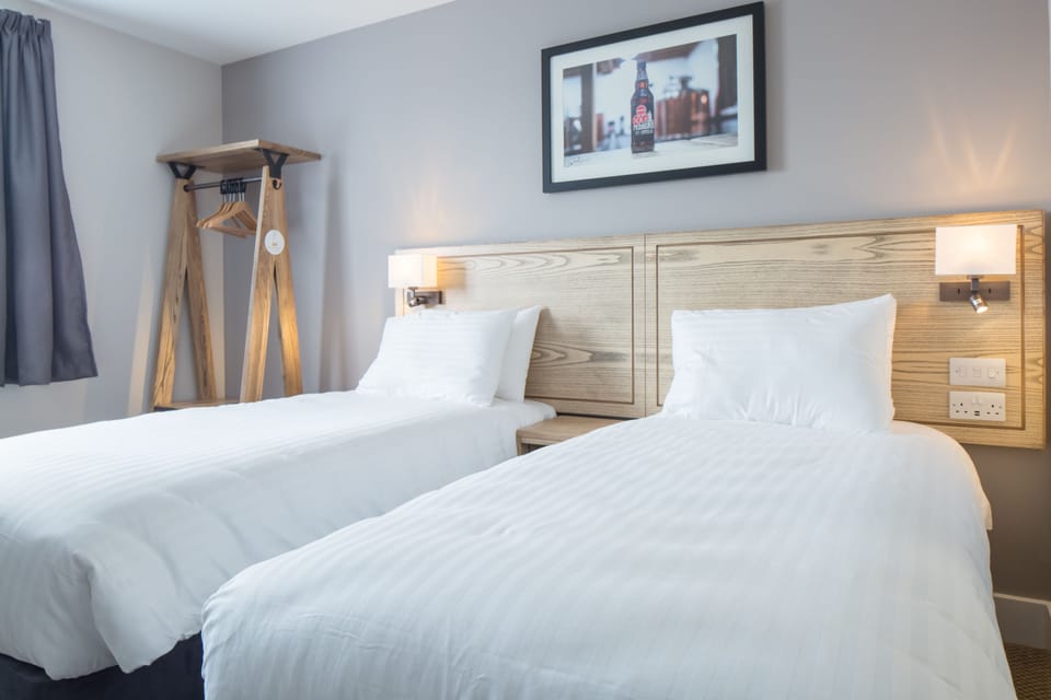 Twin Room | Desk, iron/ironing board, travel crib, free WiFi