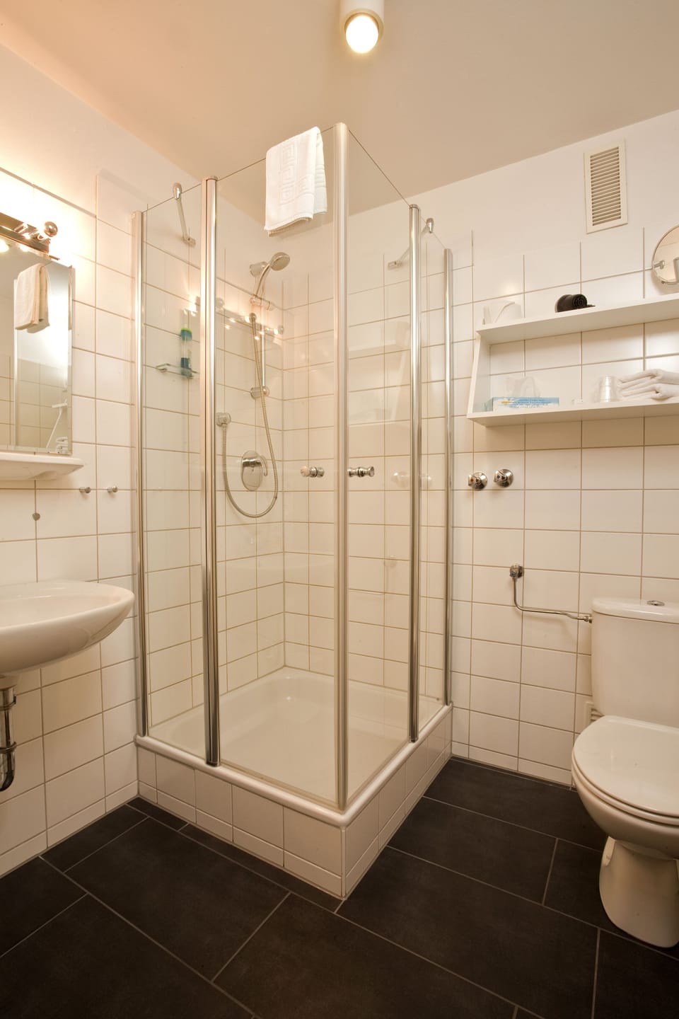 Shower, eco-friendly toiletries, hair dryer, towels