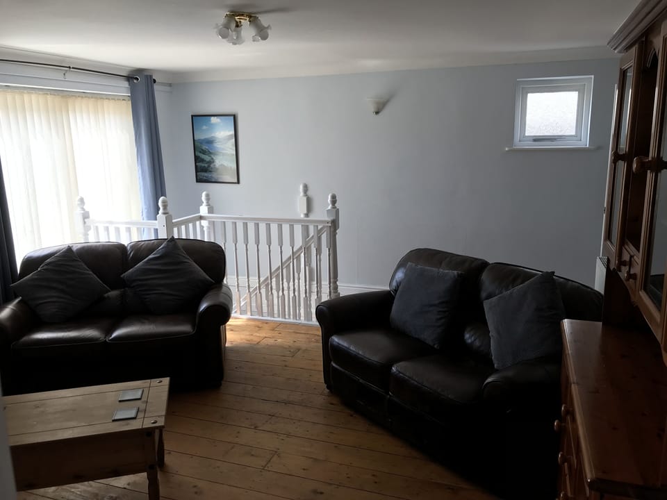 Family Apartment, Mountain View | Living area | Flat-screen TV
