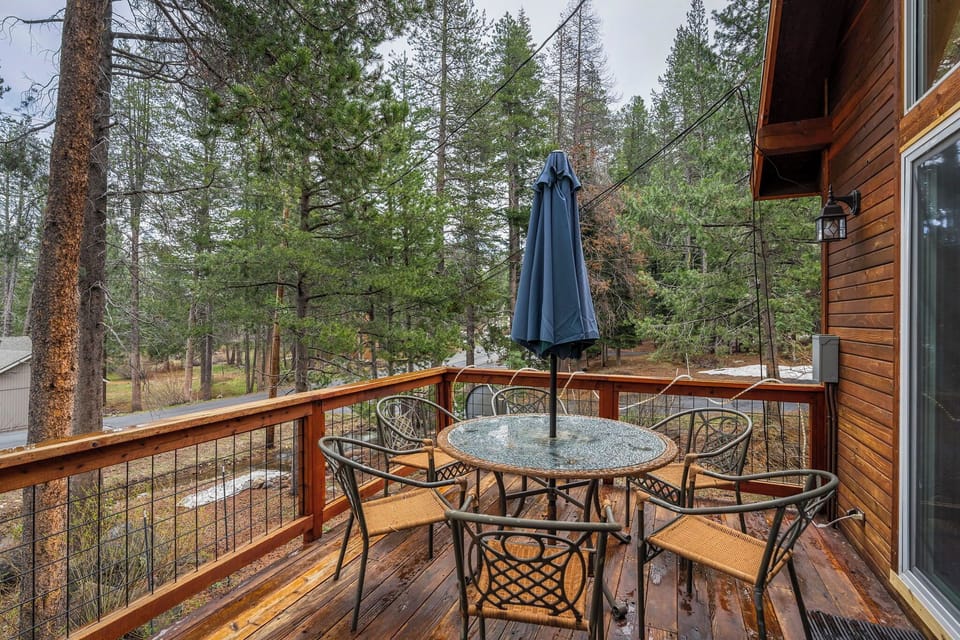 Step onto your private deck and breathe in the fresh mountain air while enjoying meals surrounded by towering pine trees.