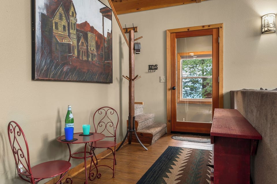 Your cozy mountain retreat welcomes you with warm wood accents, local artwork, and a peaceful spot to unwind after exploring.