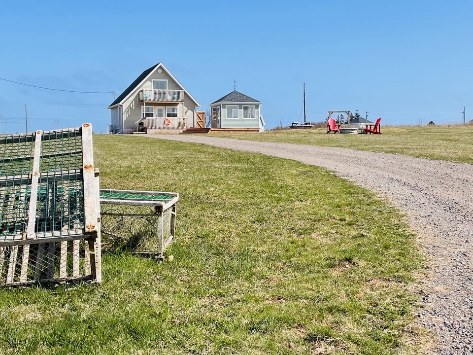 Rest A’shored as you drive up the lane! Spacious 1 acre lot!